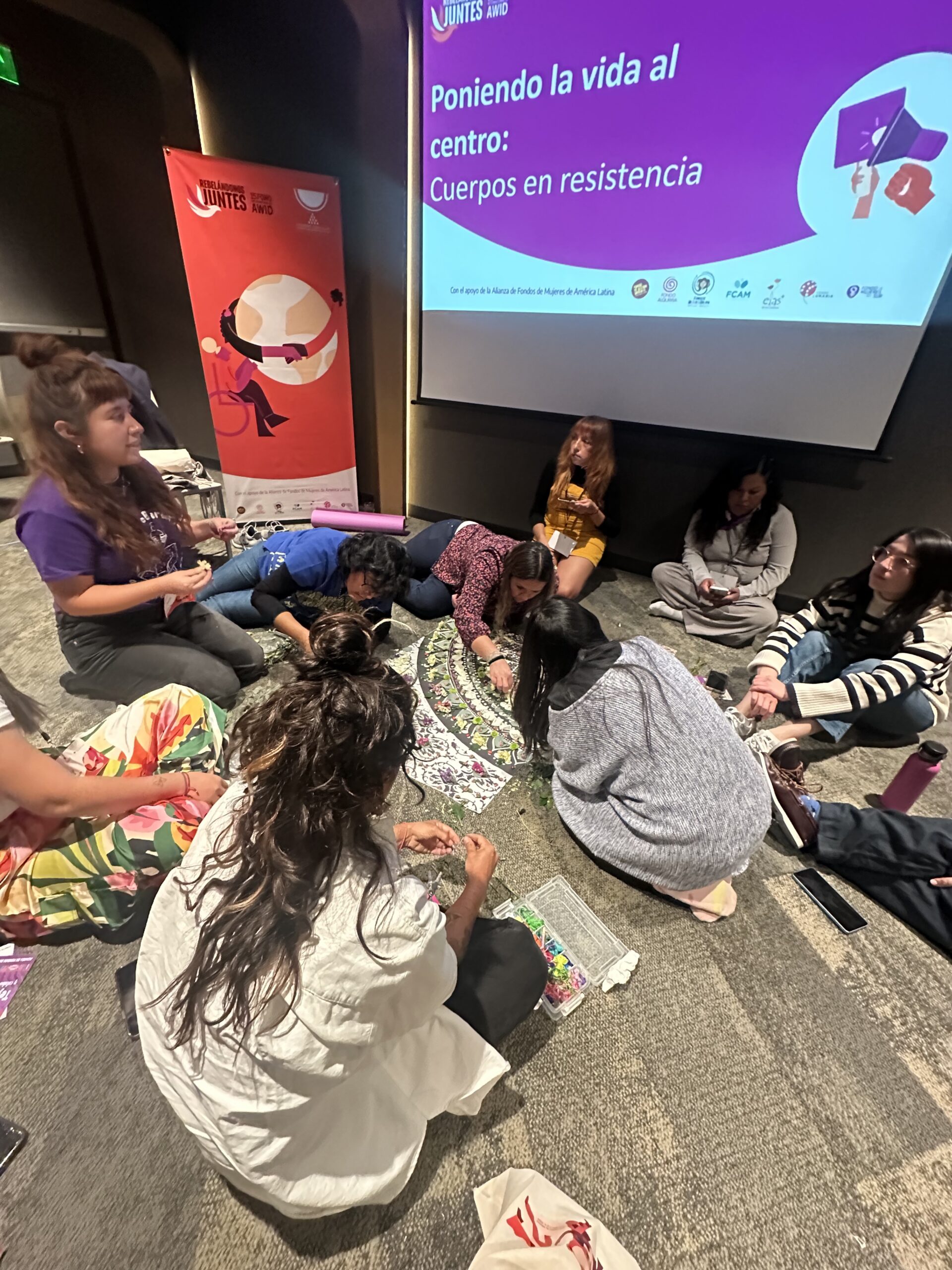 Conference attendees participating in a group activity during the forum.