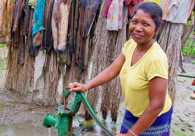 Numi woman at pump